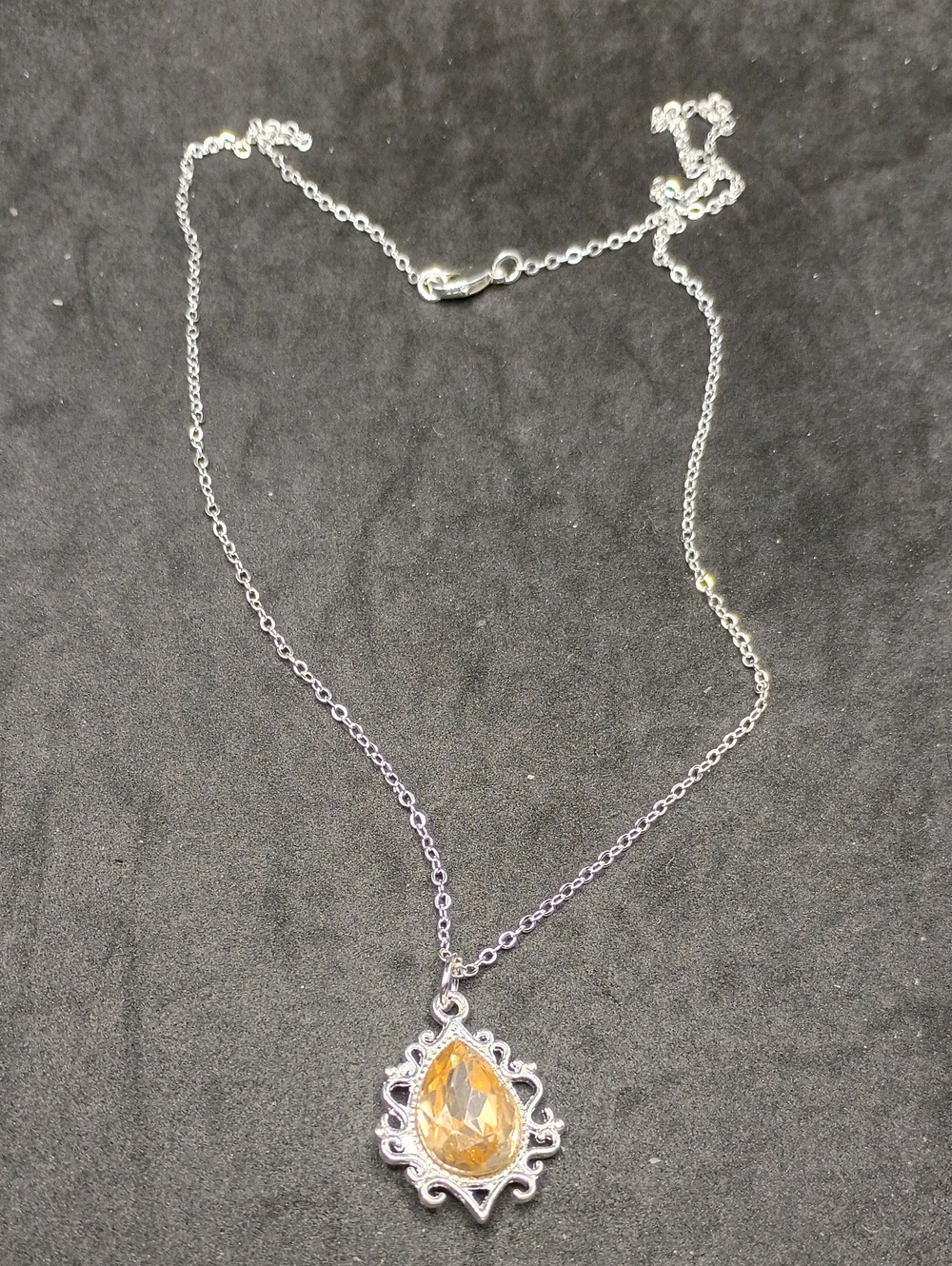 Silver Necklace with Golden Teardrop Gemstone Pendant